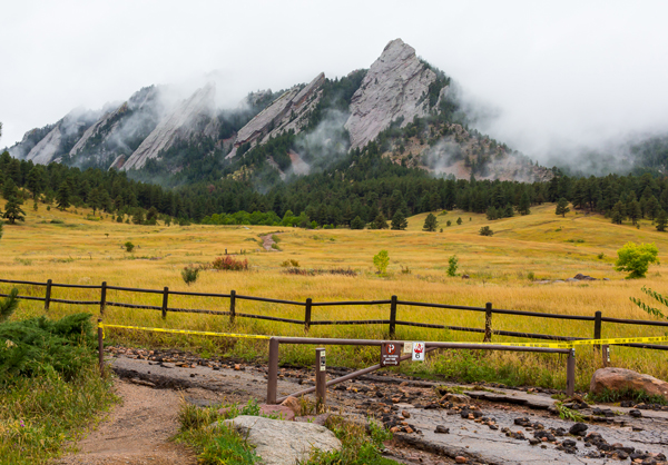 Boulder, CO floods - Chautauqua Park, with the first, second and third Flatirons emerging from the clouds. 