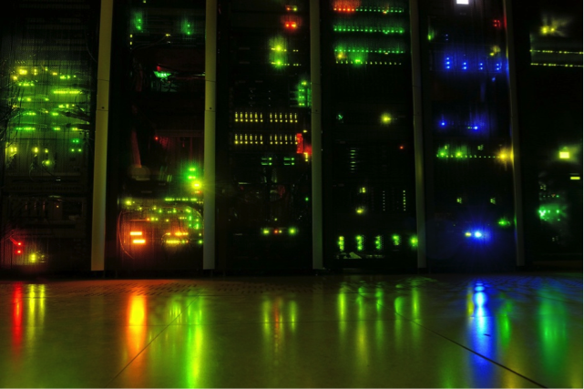 Bank of servers with different colored lights.