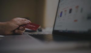Image of credit card and computer