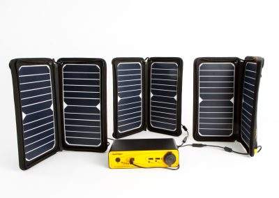 Wider view of solar panels and charger with cables