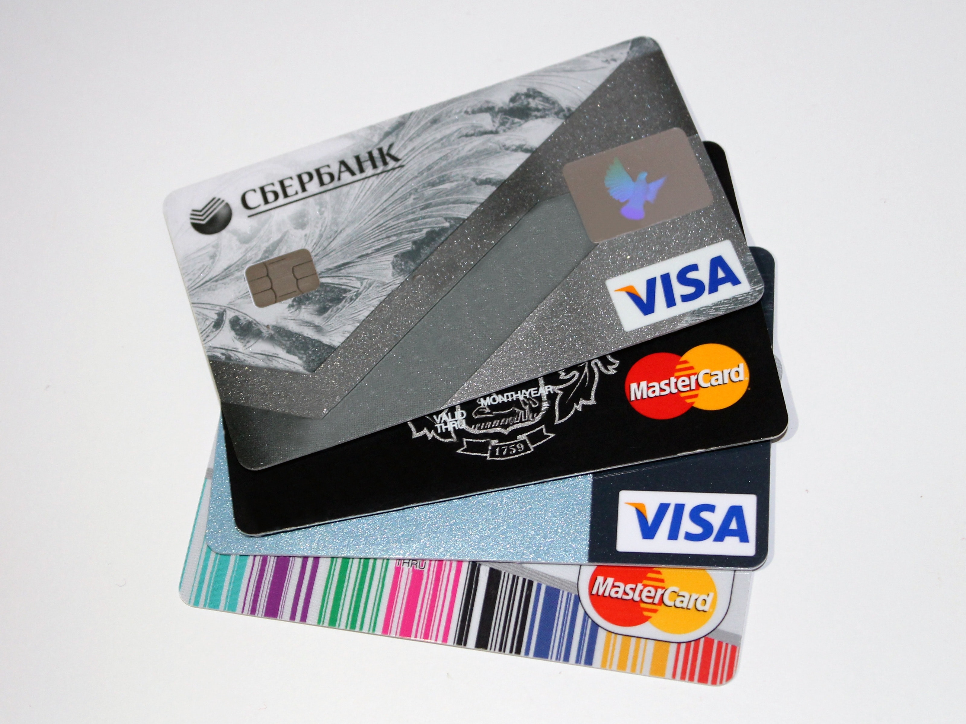 Stack of Credit Cards. ECommerce Credit Card Fraud Stack of Credit Cards. ECommerce Credit Card Fraud